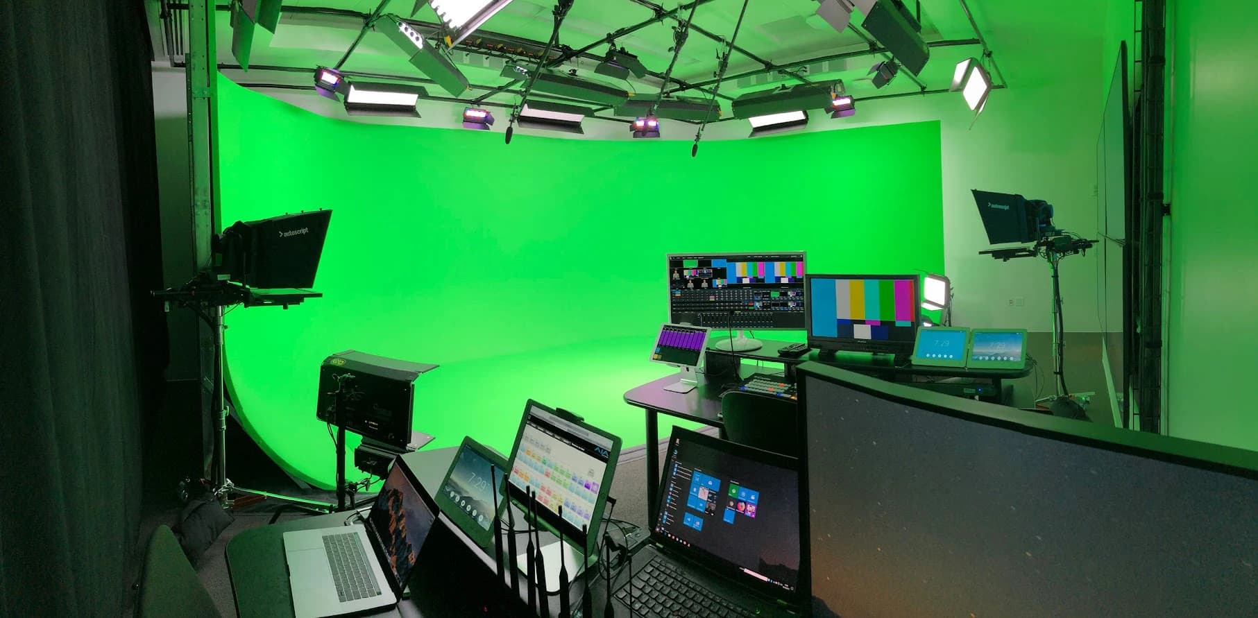 Completed Cisco green-screen studio with cameras, teleprompters, lighting, and operator monitors