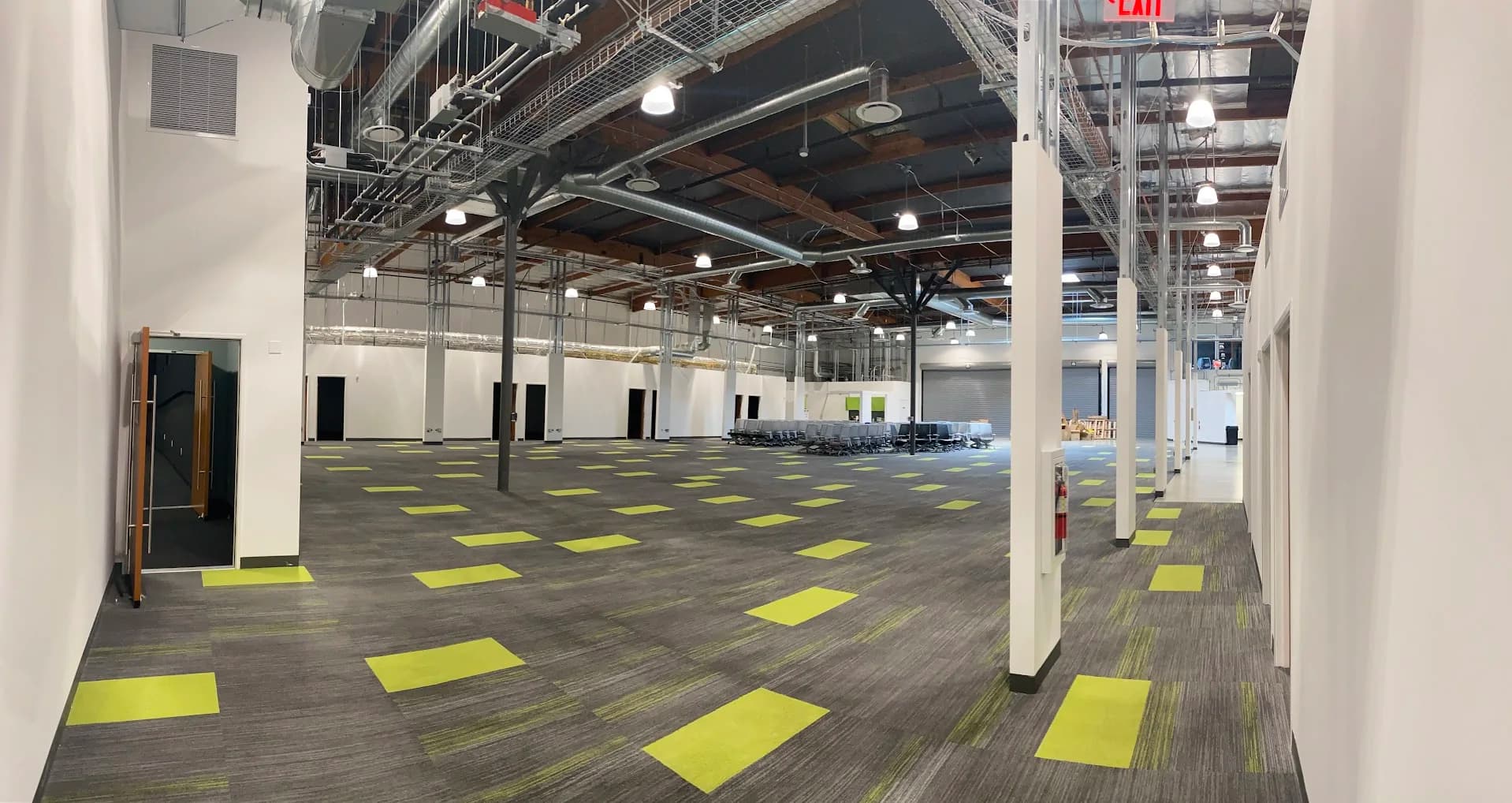 That’s No Moon production facility with a large open floor, overhead infrastructure, and flexible working areas