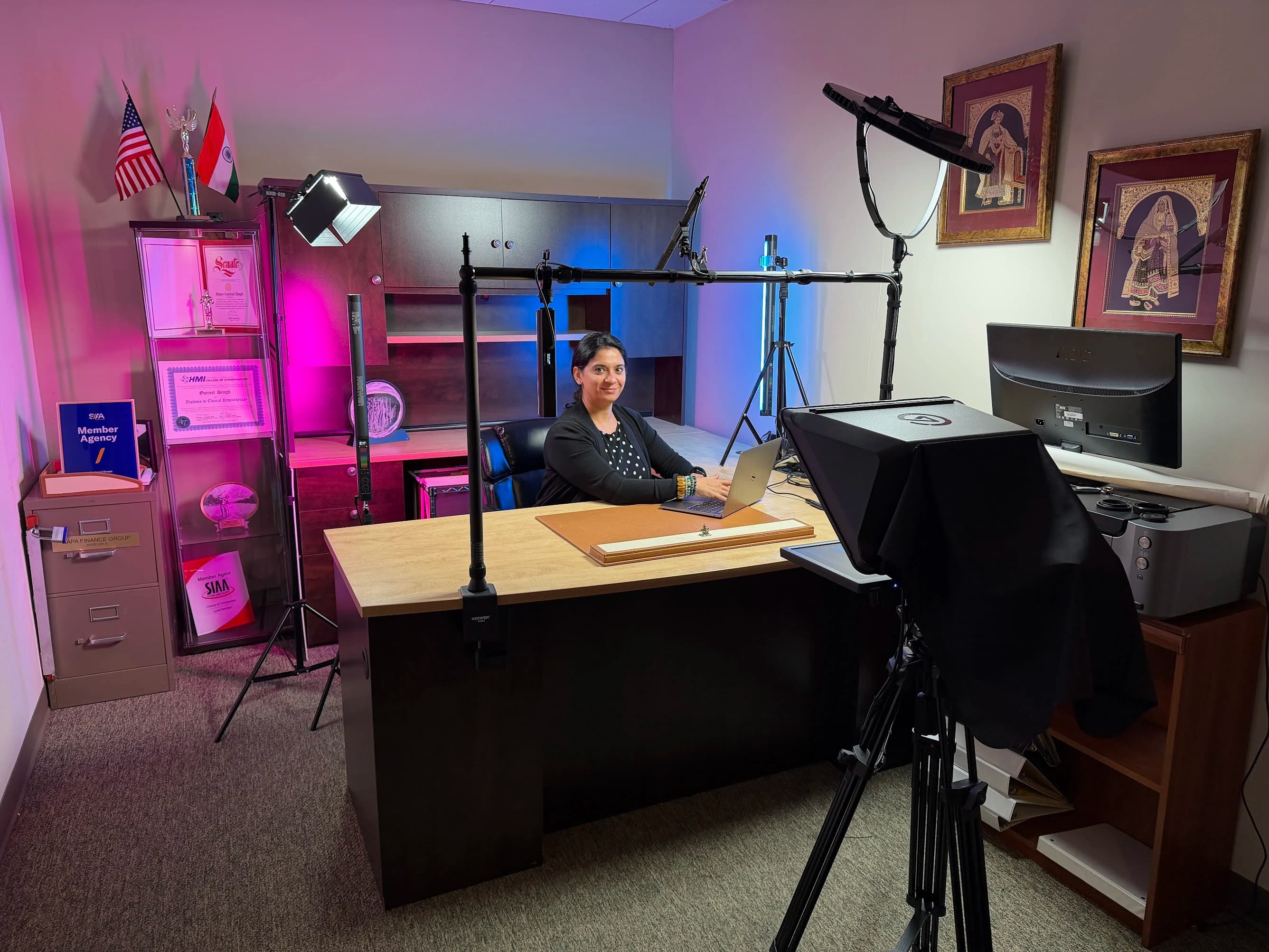 Completed Fractional Family Office personal studio with desk-mounted equipment and purple and blue lighting