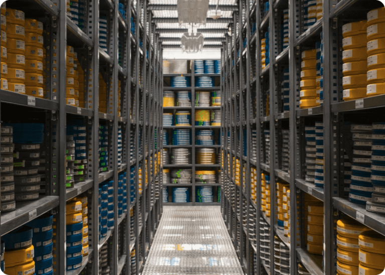 Hallway of Hollywood film storage canisters, symbolizing Jaz Entertainment’s rich legacy in the film industry.